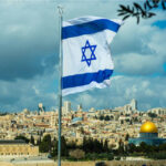 WATCH: Israeli Minister’s Shocking Taunt Video LEAKS… Israeli flag waving in front of the Jerusalem skyline with a golden dome in view