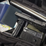 Gun Rights CRISIS: Veteran and Owner Fight Back… Handgun and magazines in an open travel bag
