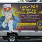 CIA Whistleblower EXPOSES Wuhan Lab Cover-Up… A van with an anti-NIH billboard featuring Anthony Fauci.