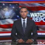 Military Murder Mystery Stuns FORT BRAGG…. News anchor presenting a report in front of an American flag backdrop