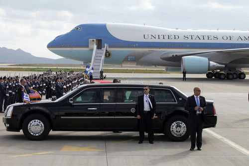 shutterstock516010972jpg Presidential motorcade limousine in front of large government aircraft on tarmac