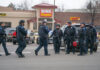 Chopper Video Sparks Police Narrative Uproar Police officers gathered outside King Soopers grocery store.