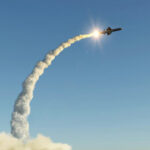 Missiles Fly—Trump Freezes Netanyahu Missile launching into the sky with smoke trail.