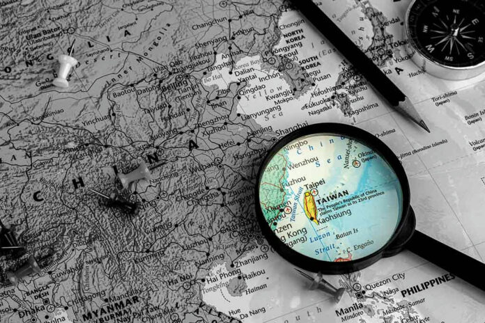 1531936925 Map of China, Taiwan magnified, surrounded by pins, compass.