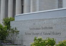 White House Targets Smithsonian Narratives Smithsonian Institution museum exterior with engraved stone sign