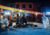 FBI Vault Blackout After Trump Shooting Police and forensic team investigating a crime scene in a dark alley