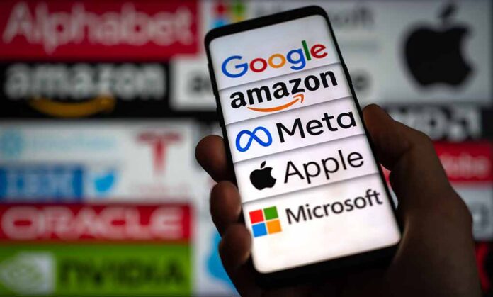 shutterstock_2297530397-1 Smartphone screen showing major tech company logos