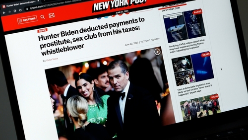 New York Post article about Hunter Biden on laptop screen.